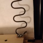 Upholstery clip holding IKEA spring